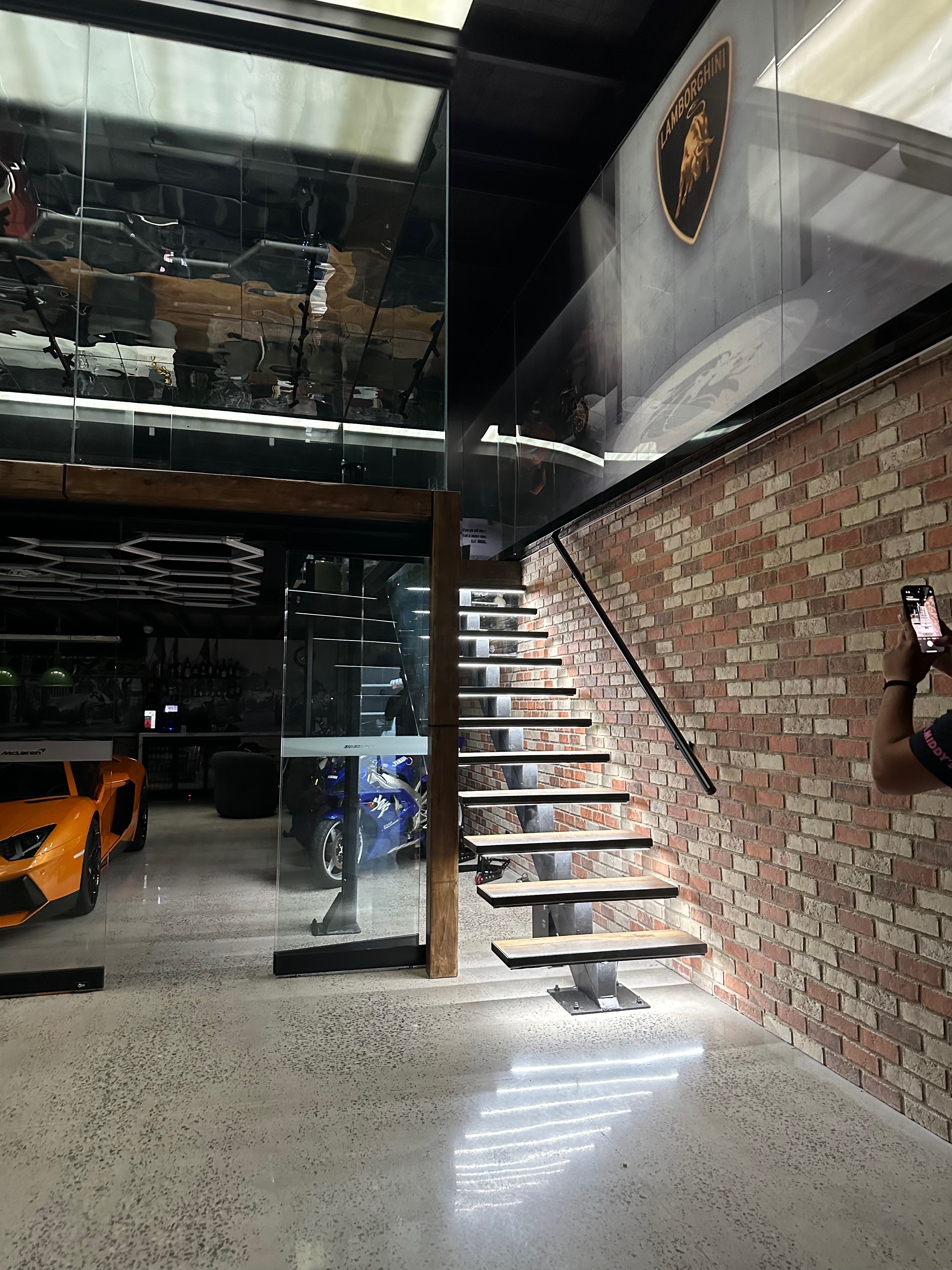 Modern staircase with glass partitions in the showroom